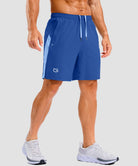 lightweight 7" pocketed athletic shorts in royal blue - on model front view