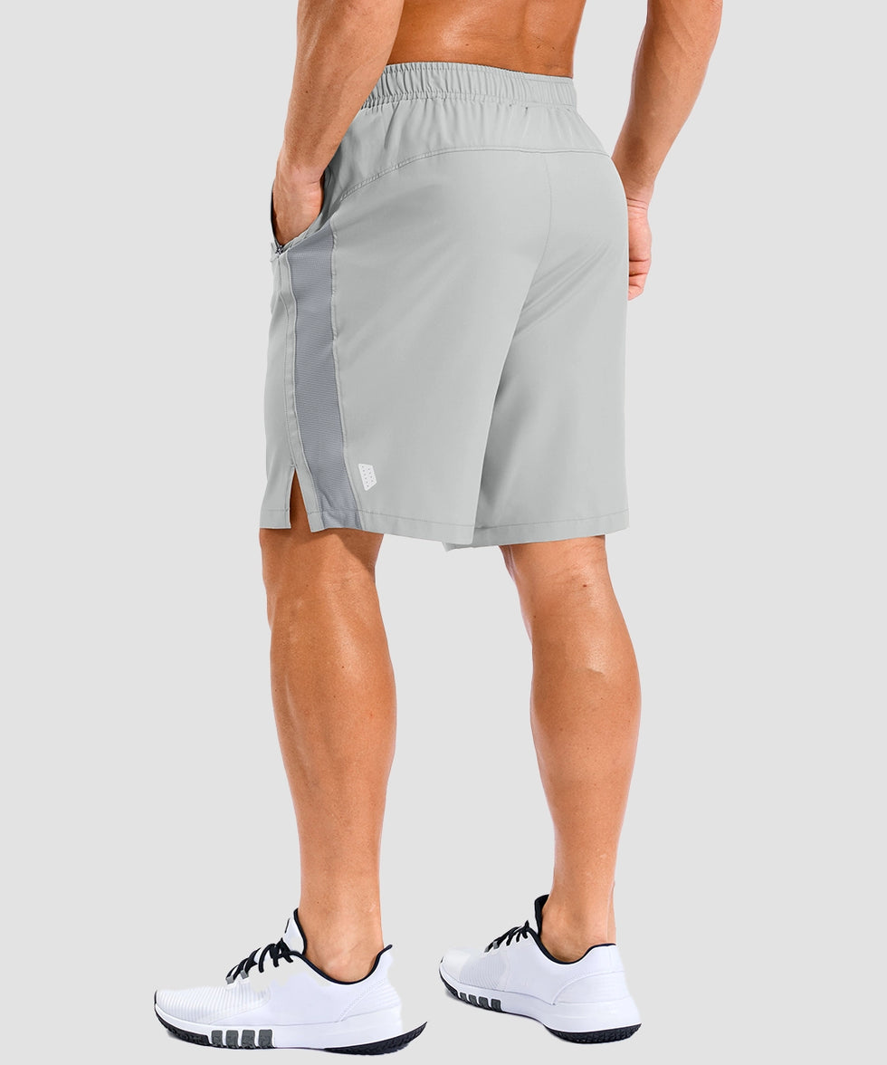lightweight 9" pocketed athletic shorts in bright gray - on model back view