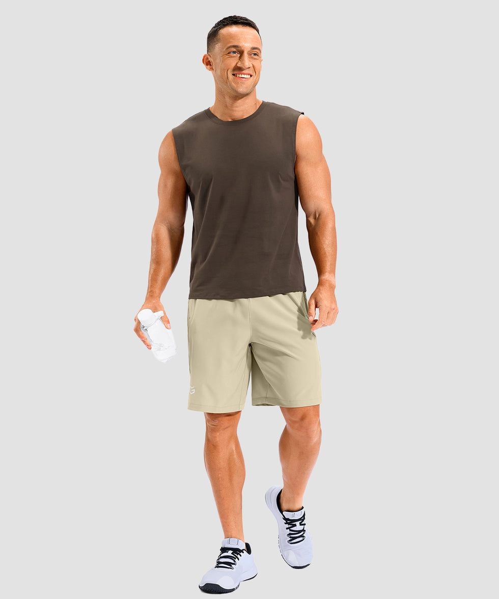 lightweight 9" pocketed athletic shorts in light khaki - on model view