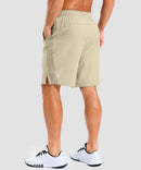 lightweight 9" pocketed athletic shorts in light khaki - on model back view