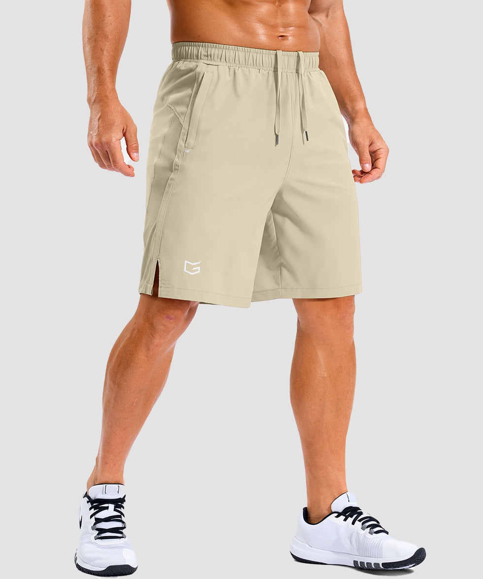 lightweight 9" pocketed athletic shorts in light khaki - on model front view
