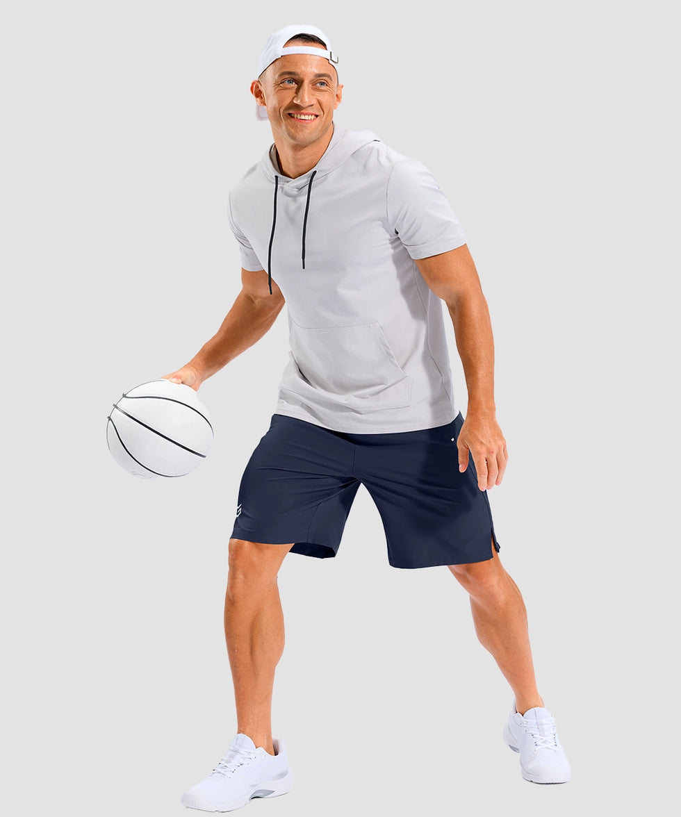 lightweight 9" pocketed athletic shorts in navy - on model view