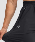 men's drawstring with 3 zipper pockets pant in black - stretchy details view