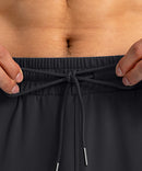 men's drawstring with 3 zipper pockets pant in black - waistband detail view