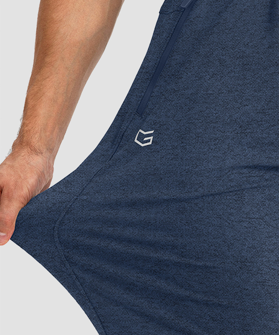 men's drawstring with 3 zipper pockets pant in heathered academy blue - stretchy fabric details view