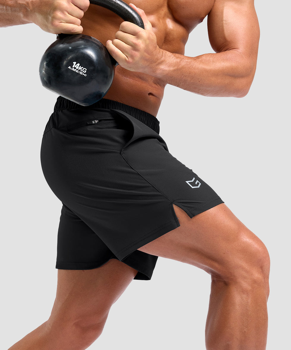 men's elastic waist split hem shorts 5'' in black - split hem detail view