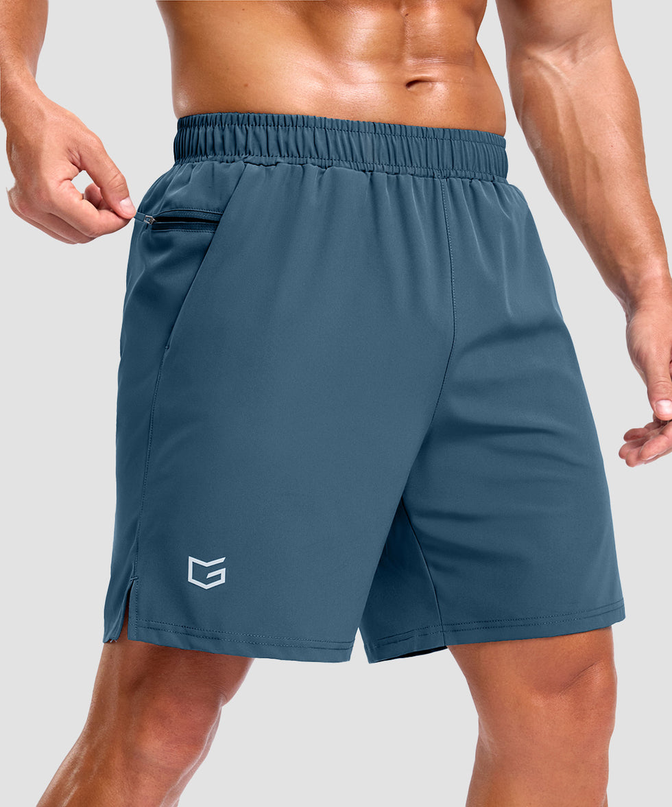 men's elastic waist split hem shorts 7'' in indigo blue - pocket detail view
