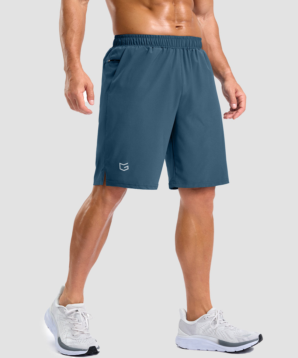 men's elastic waist split hem shorts 9'' in indigo blue - front view