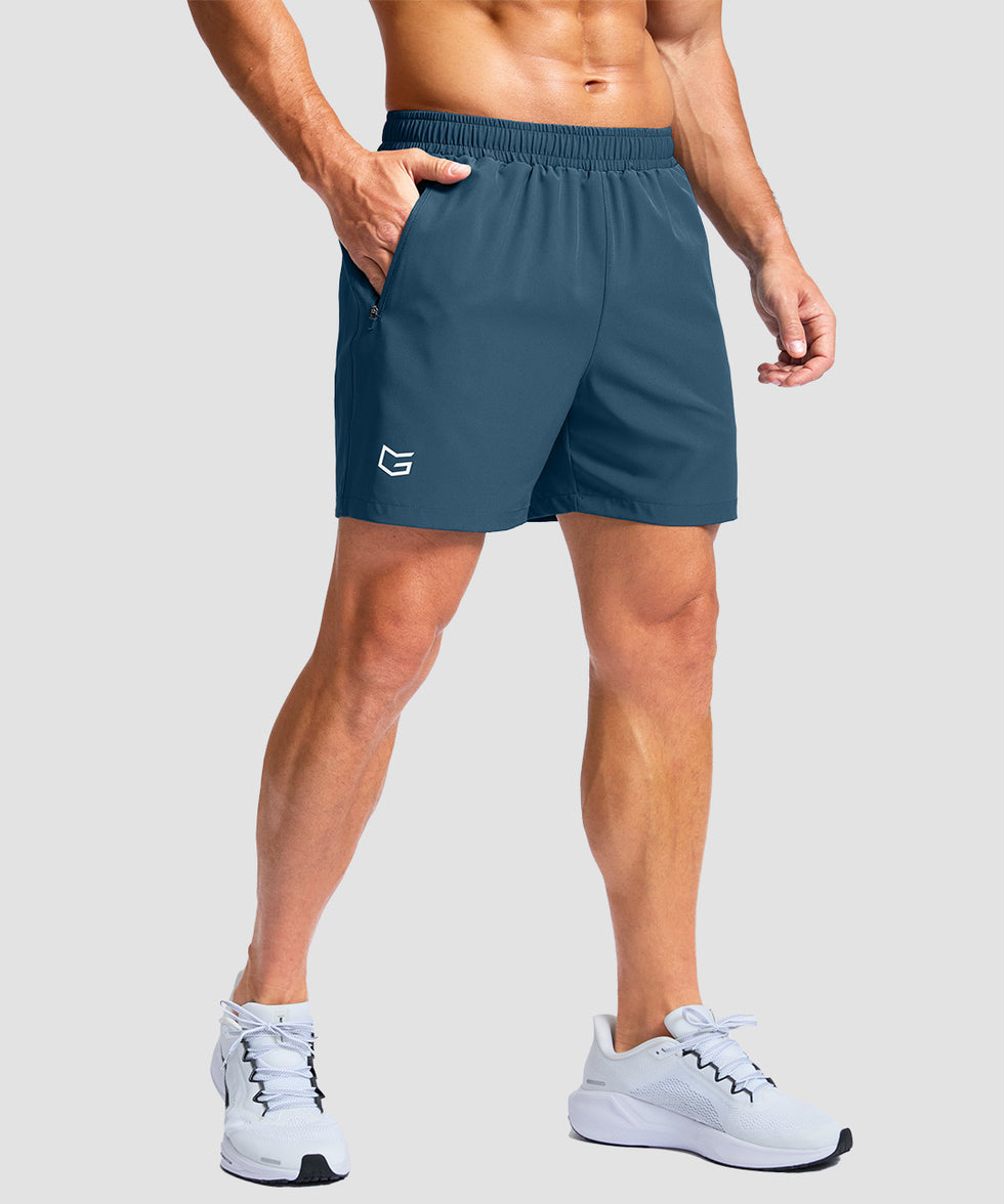 men's elastic waist zipper pockets short 5'' in dusty blue - front view