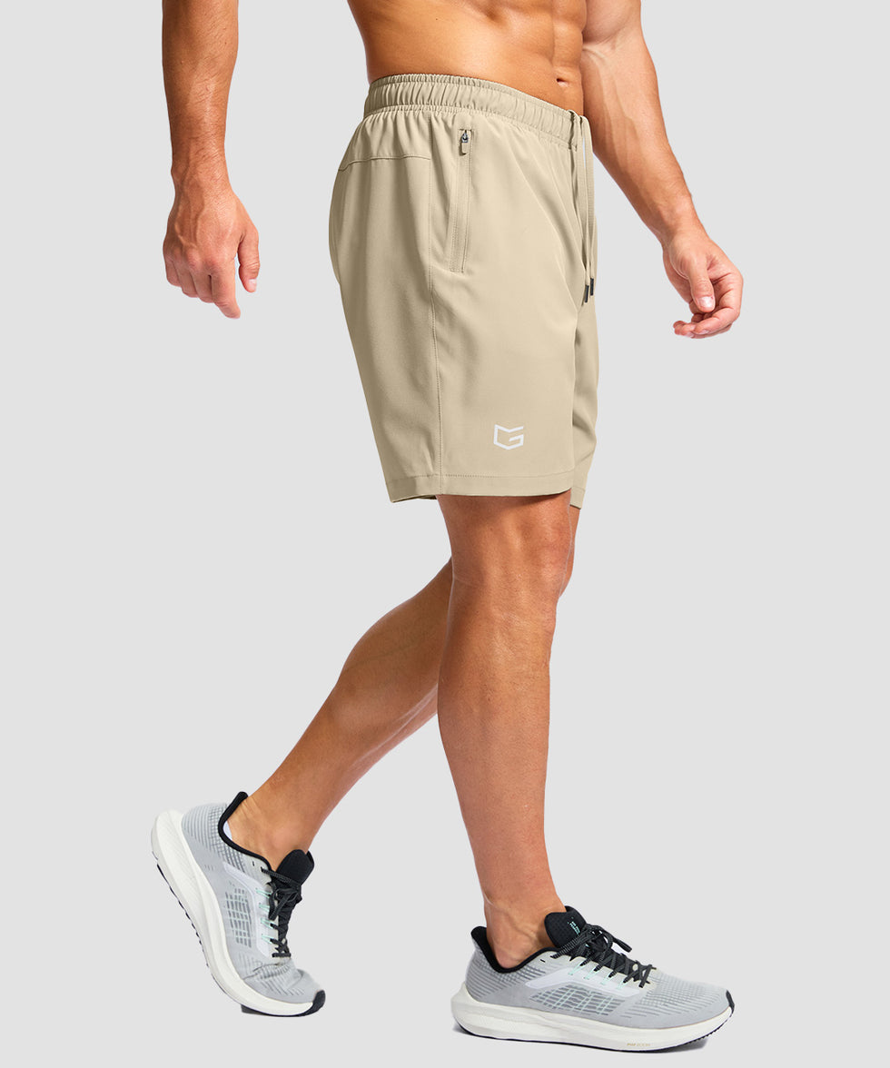 men's elastic waist zipper pockets short 7'' in light khaki - side view