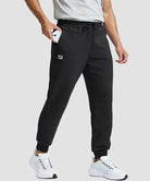 men's fleece-lined cotton joggers in black - zipper pocket detail view