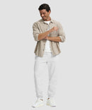 men's fleece-lined cotton joggers in grayish white - front view