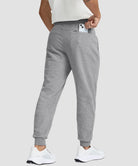 men's fleece-lined cotton joggers in heather light gray - back zipper pocket detail view