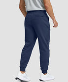men's fleece-lined cotton joggers in navy - back view