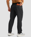 men's fleece-lined zip pockets stretch sweatpants in black - back view