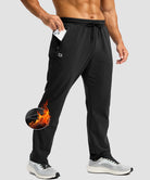 men's fleece-lined zip pockets stretch sweatpants in black - zip pocket detail view