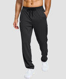 men's lightweight pocketed sweatpants in black - side view