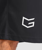 men's lightweight with zipper pockets short 11'' in black - hem detail view