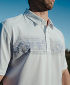 men's line print dry fit golf polo in white leaves - button detail