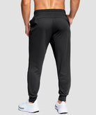 men's mid-rise with pockets stretchy joggers in black - back view