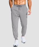 men's mid-rise with pockets stretchy joggers in light gray - front view