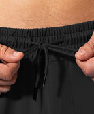 men's mid-waist zipper pockets jogger in black - waist detail view
