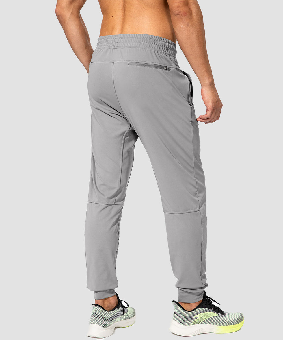 men's mid-waist zipper pockets jogger in light gray - back view
