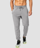 men's mid-waist zipper pockets jogger in light gray - front view