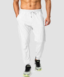 men's mid-waist zipper pockets joggers in white - front view