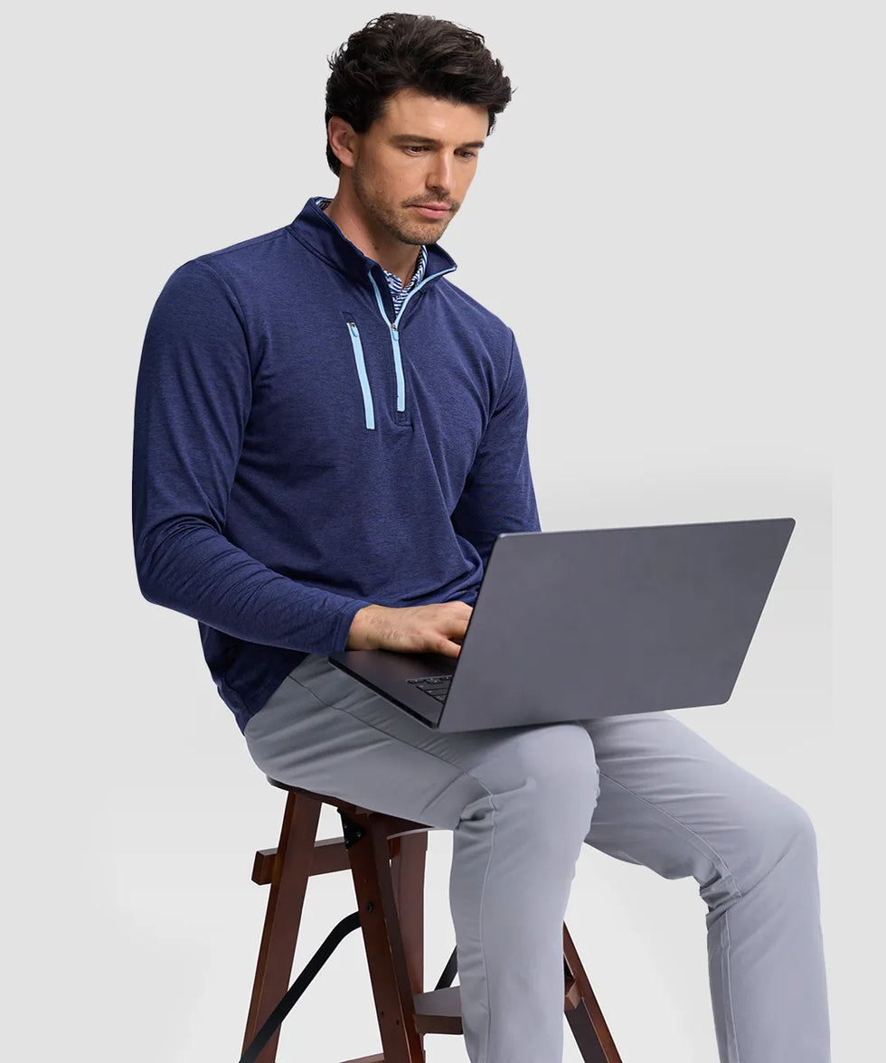 men's quarter zip golf pullover with chest pocket in heathered academy blue - side view