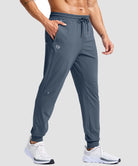 men's reflective zip pockets joggers in dusty blue - side view