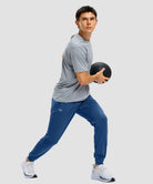 men's static-free stretch athletic joggers in heather dark blue - side view