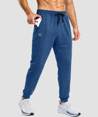men's static-free stretch athletic joggers in heather dark blue - zipper pocket detail view