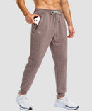 men's static-free stretch athletic joggers in heather dark pink - zipper pocket detail view