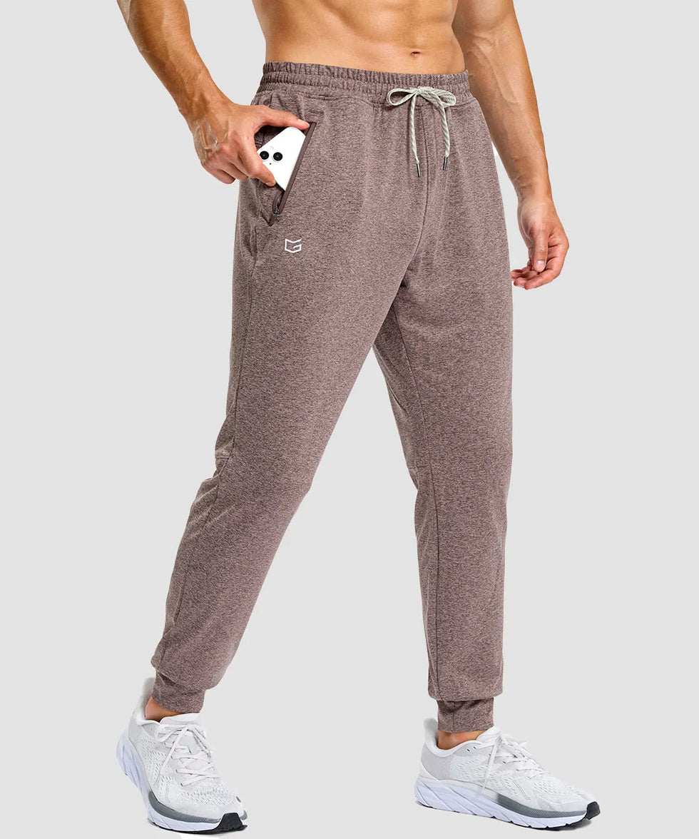 men's static-free stretch athletic joggers in heather dark pink - zipper pocket detail view