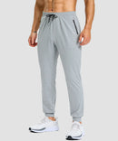 men's static-free stretch athletic joggers in heather light gray - front view