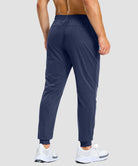 men's static-free stretch athletic joggers in heathered academy blue - back view