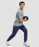 men's static-free stretch athletic joggers in heathered academy blue - side view