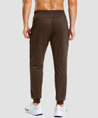 men's static-free stretch athletic joggers in heathered brown - back view