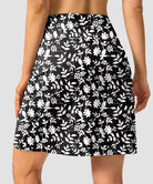 mesh-lined long golf skirt in black floral - back view