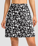 mesh-lined long golf skirt in black floral - front view