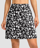 mesh-lined long golf skirt in black floral - front view