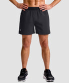 mid rise elastic waist slit short 5" in black - on model front view