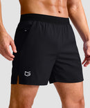mid rise elastic waist slit short 5" in black - side view