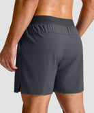 mid rise elastic waist slit short 5" in dark gray - back view
