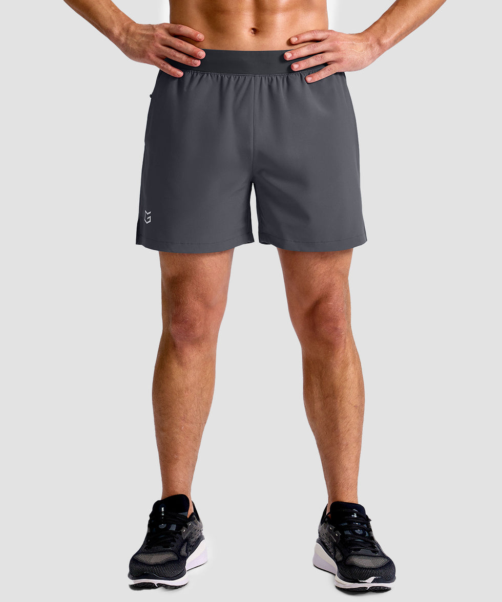 mid rise elastic waist slit short 5" in dark gray - on model front view