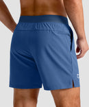 mid rise elastic waist slit short 5" in dusty blue - back view