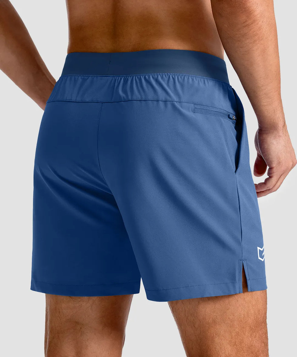 mid rise elastic waist slit short 5" in dusty blue - back view