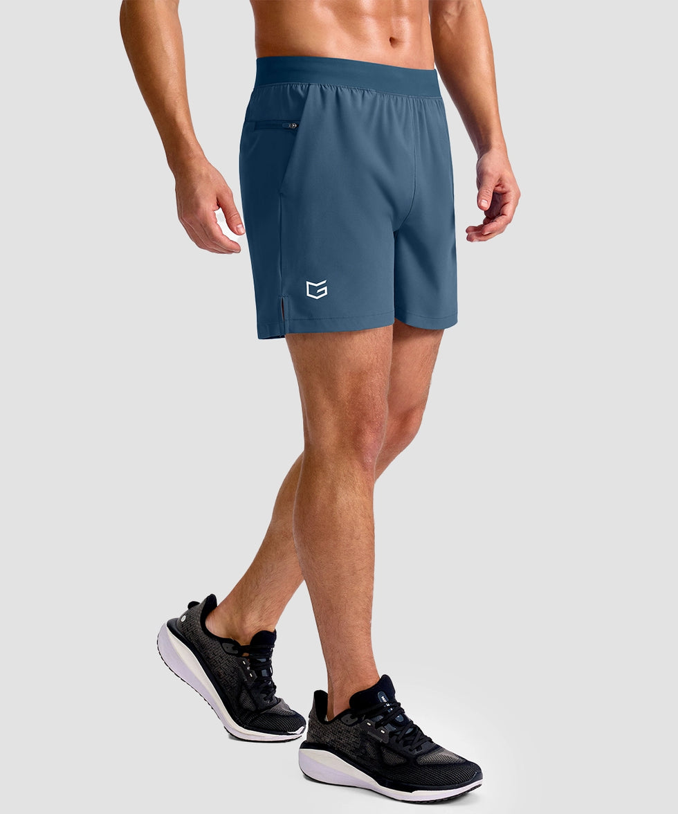 mid rise elastic waist slit short 5" in gray blue - on model side view