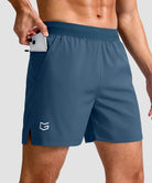 mid rise elastic waist slit short 5" in gray blue - pocket detail view